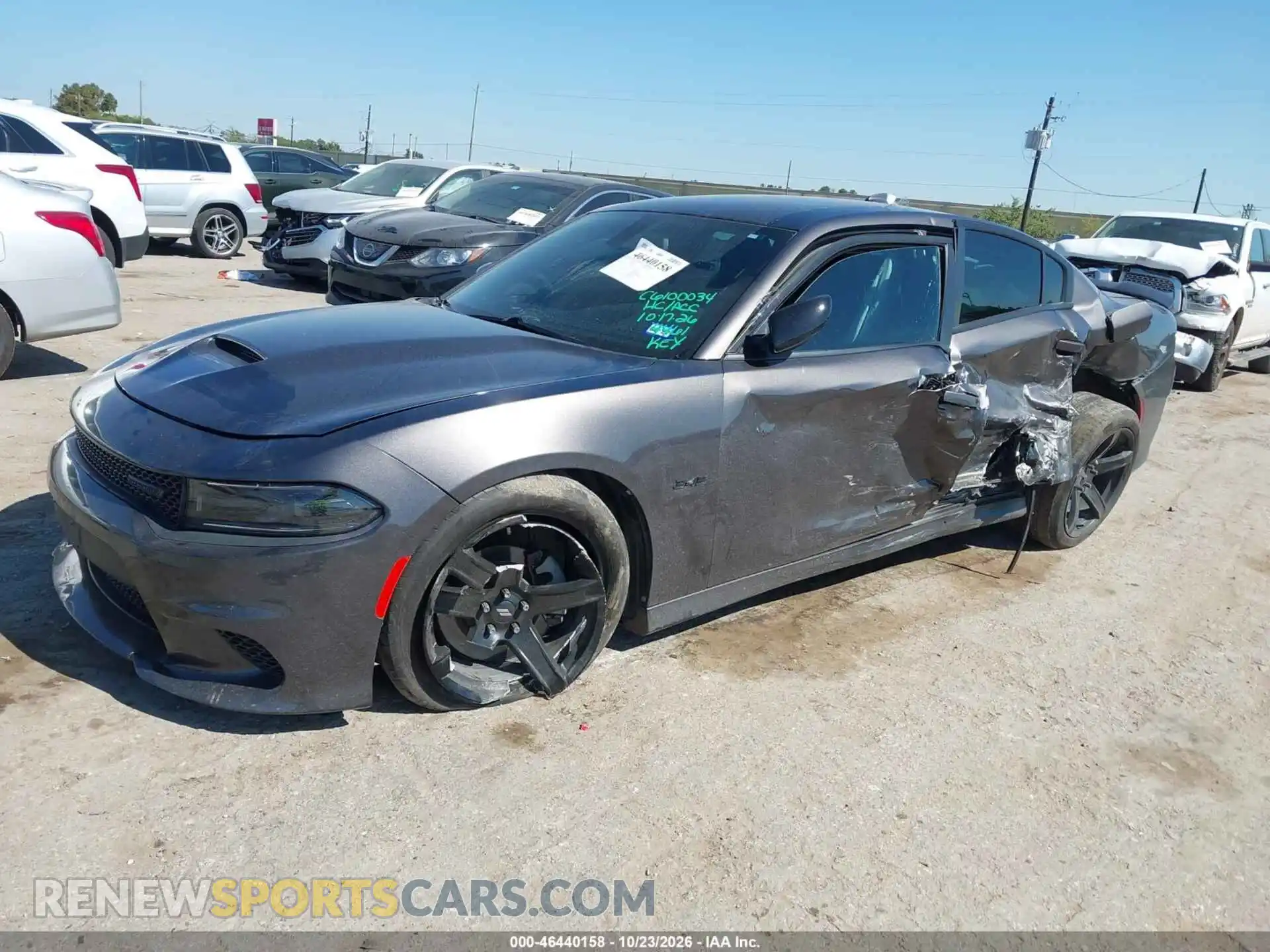 2 fotografías del automóvil dañado 2C3CDXCT2PH584461 DODGE CHARGER 2023