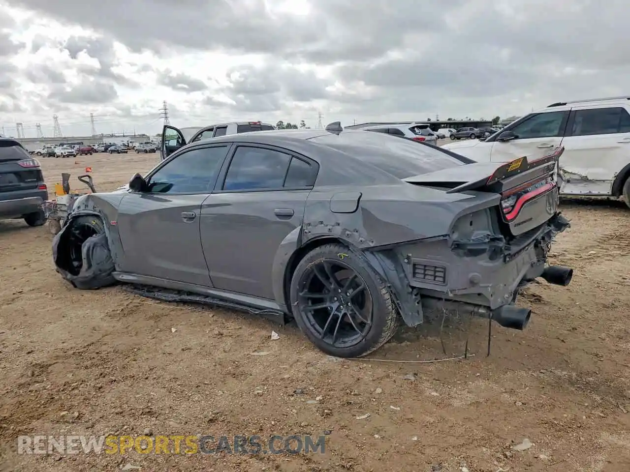 2 fotografías del automóvil dañado 2C3CDXGJ0PH686625 DODGE CHARGER 2023