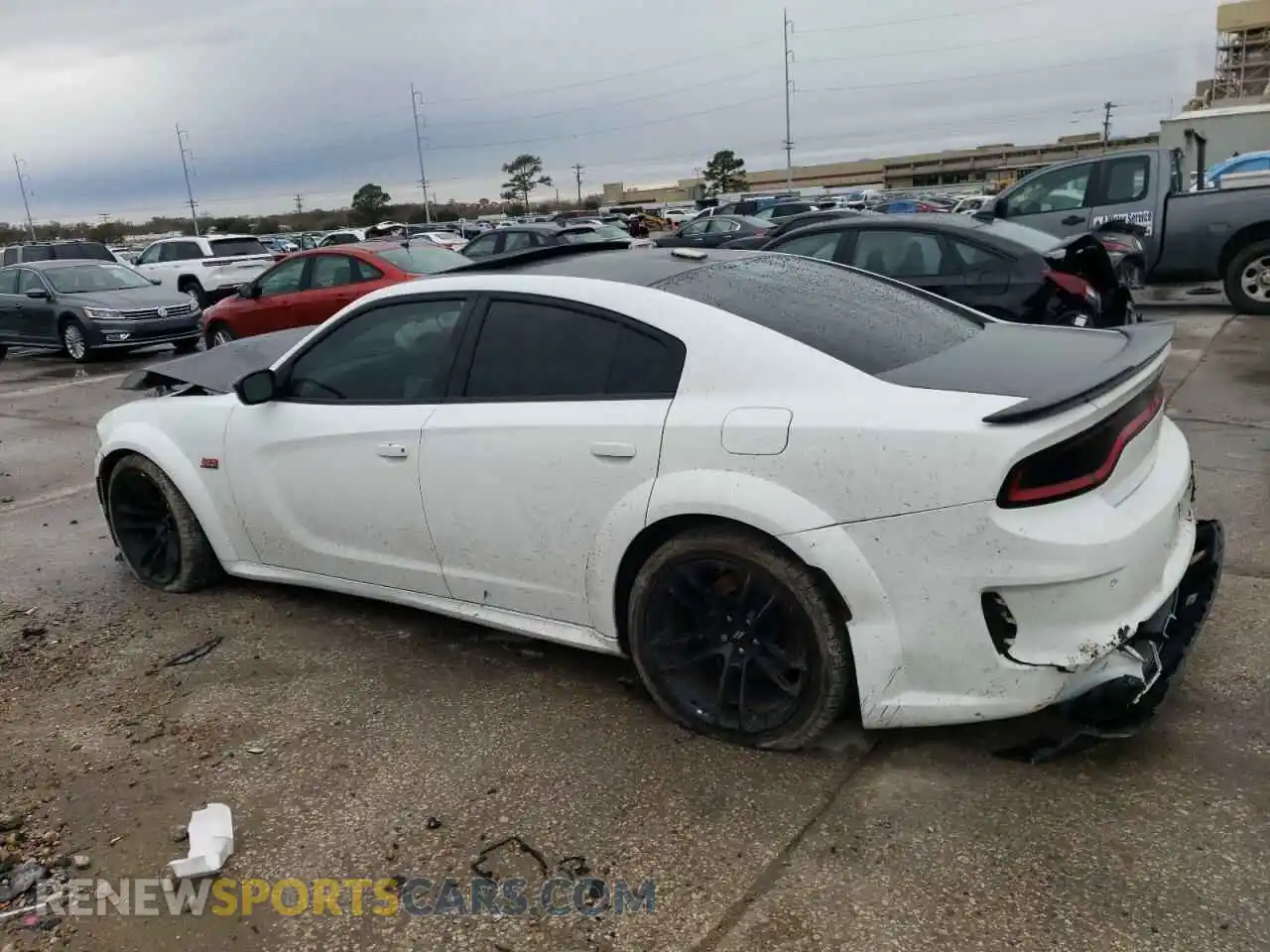 2 Photograph of a damaged car 2C3CDXGJ4PH547923 DODGE CHARGER 2023