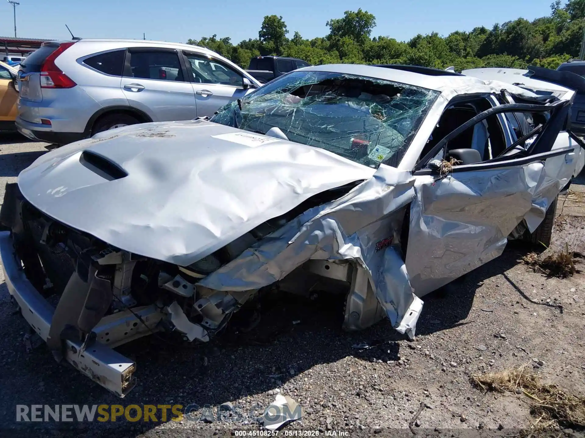 2 Photograph of a damaged car 2C3CDXGJ4PH700879 DODGE CHARGER 2023