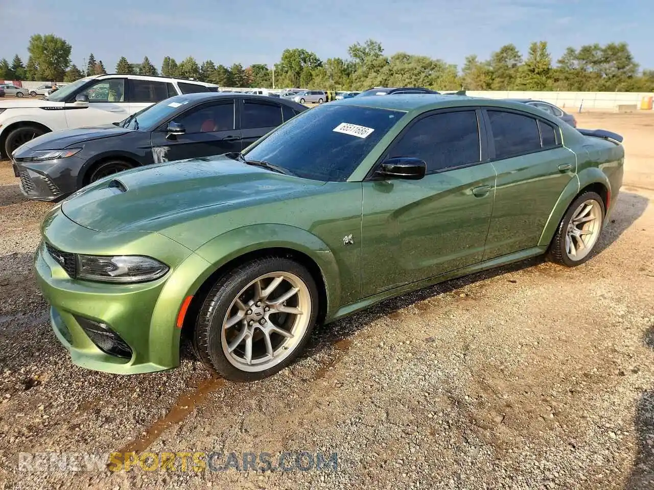 1 Photograph of a damaged car 2C3CDXGJ9PH597779 DODGE CHARGER 2023