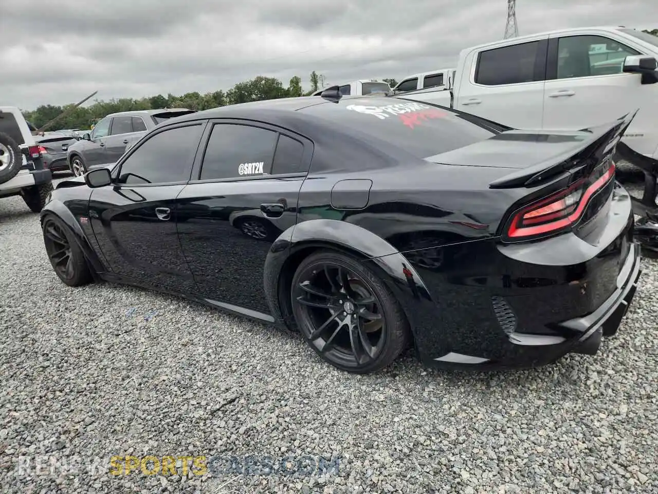 2 Photograph of a damaged car 2C3CDXGJXPH508561 DODGE CHARGER 2023