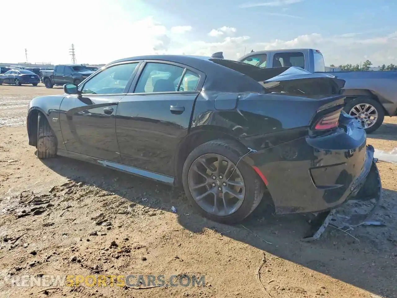 2 fotografías del automóvil dañado 2C3CDXGJXPH548011 DODGE CHARGER 2023