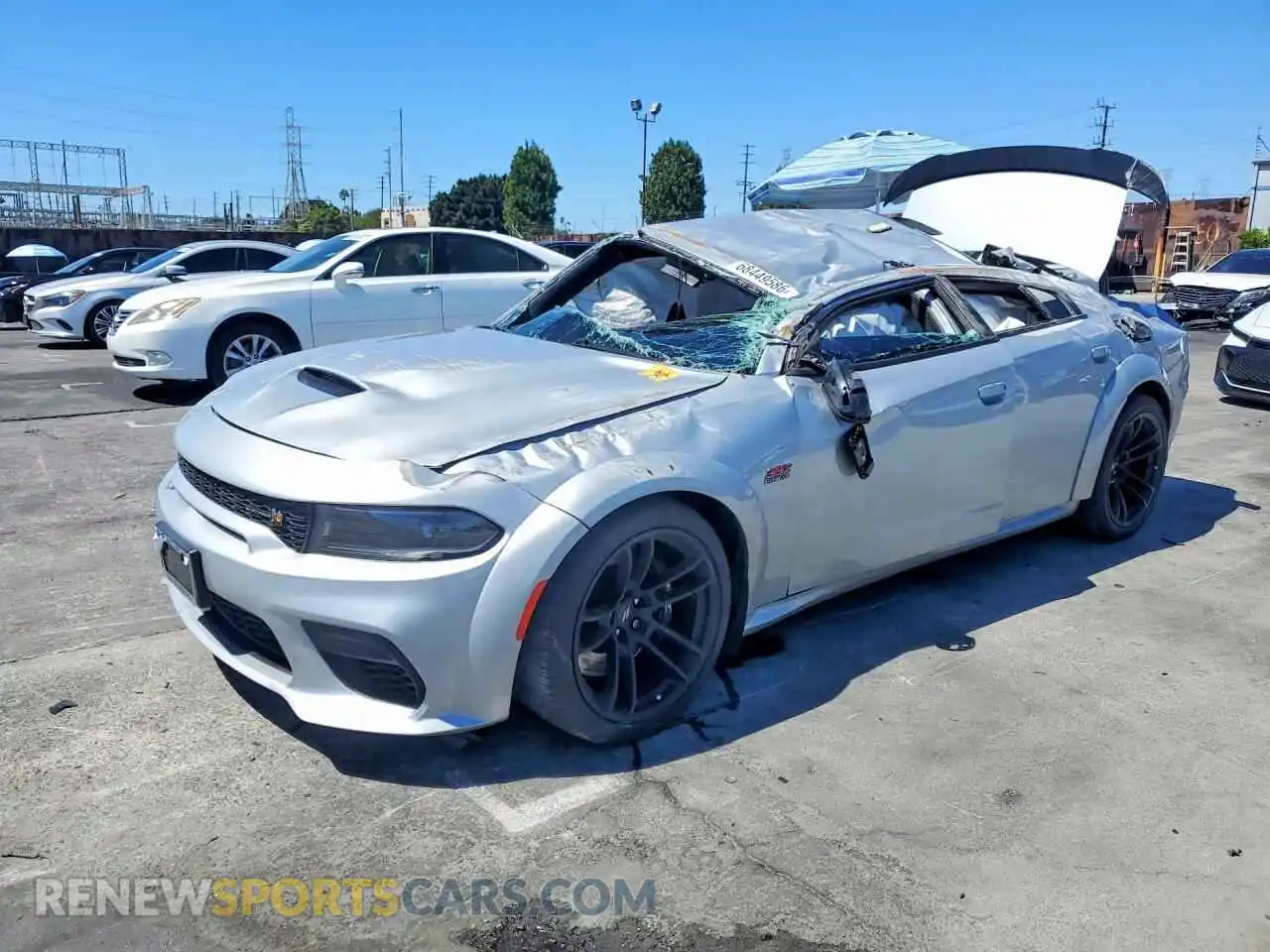 1 Photograph of a damaged car 2C3CDXGJXPH699110 DODGE CHARGER 2023