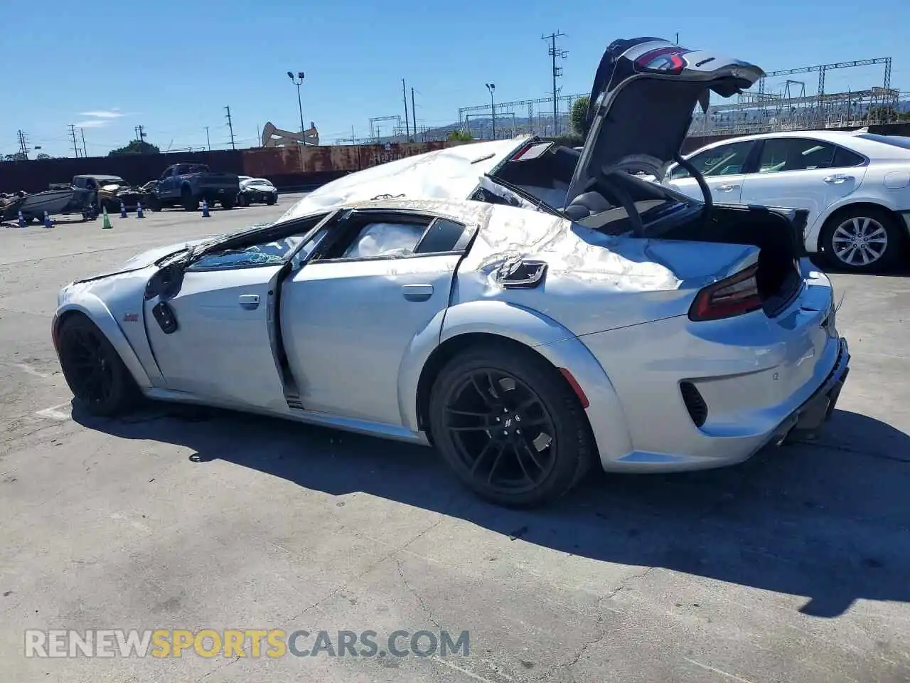 2 Photograph of a damaged car 2C3CDXGJXPH699110 DODGE CHARGER 2023