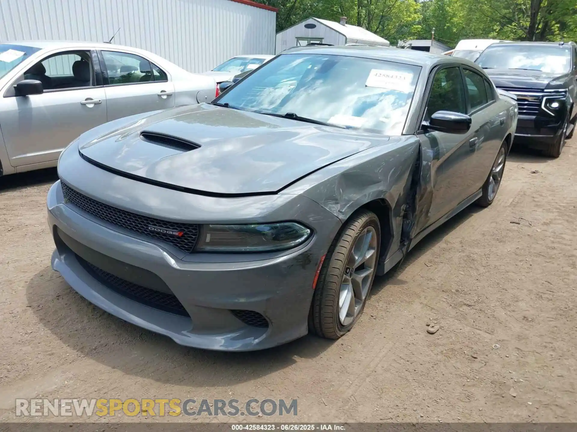 2 fotografías del automóvil dañado 2C3CDXHG1PH591672 DODGE CHARGER 2023