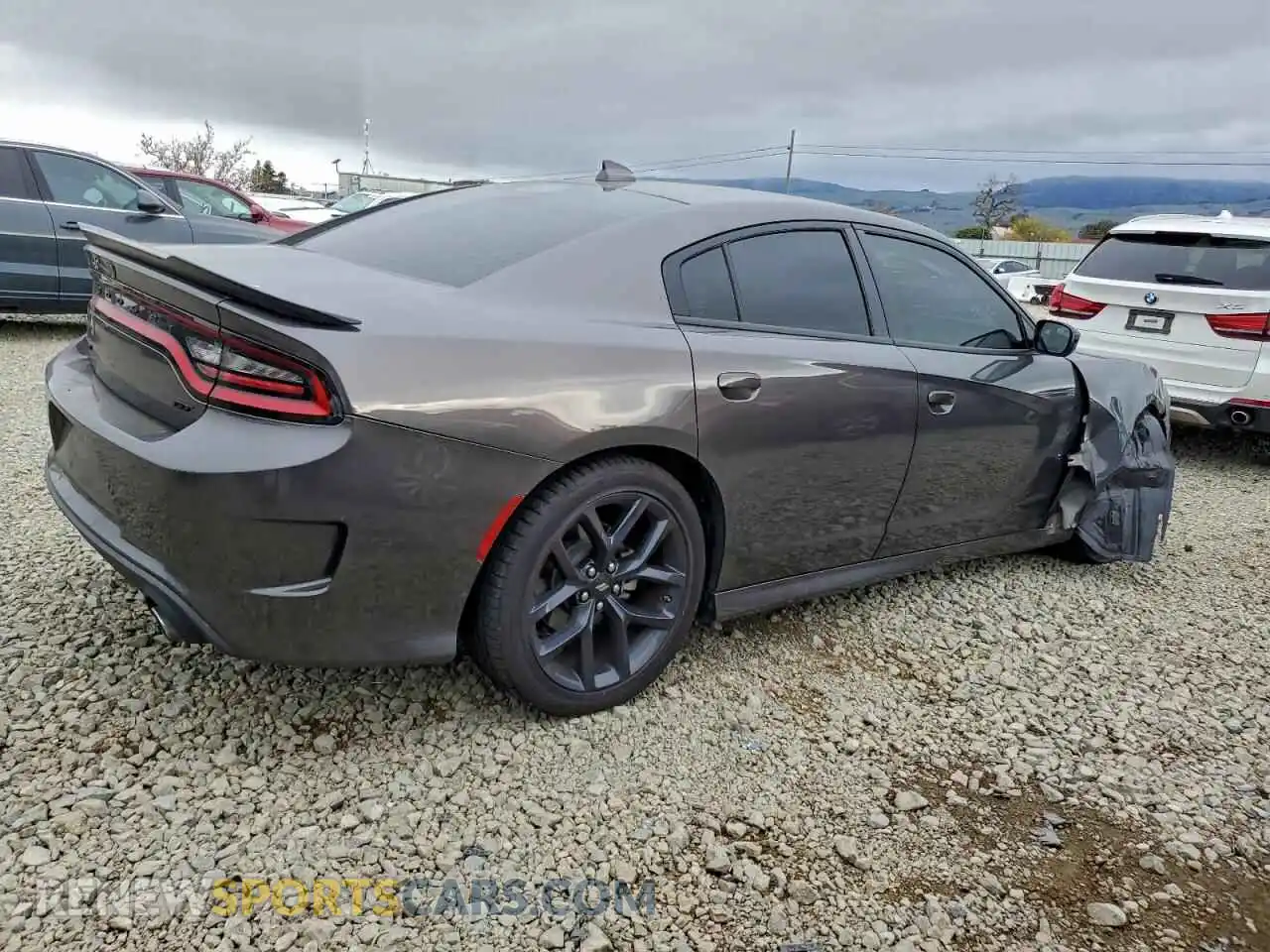 3 fotografías del automóvil dañado 2C3CDXHG3PH671443 DODGE CHARGER 2023