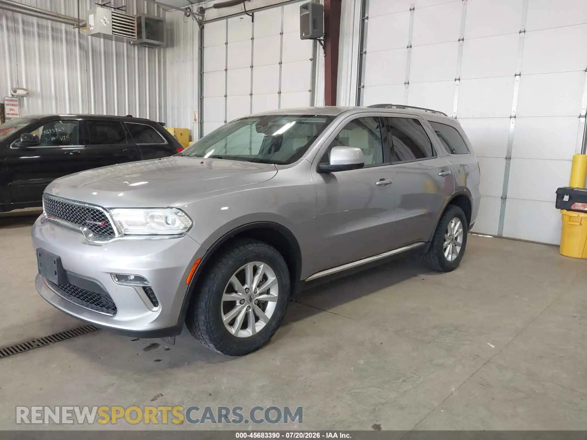 2 fotografías del automóvil dañado 1C4RDJAG0MC544631 DODGE DURANGO 2021