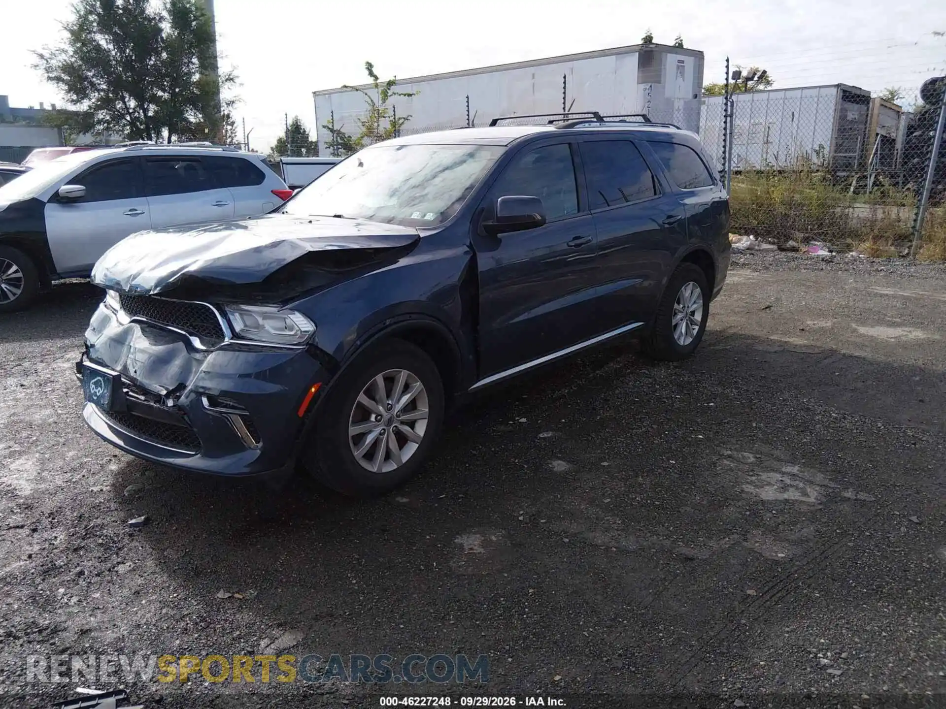 2 fotografías del automóvil dañado 1C4RDJAG1MC557582 DODGE DURANGO 2021