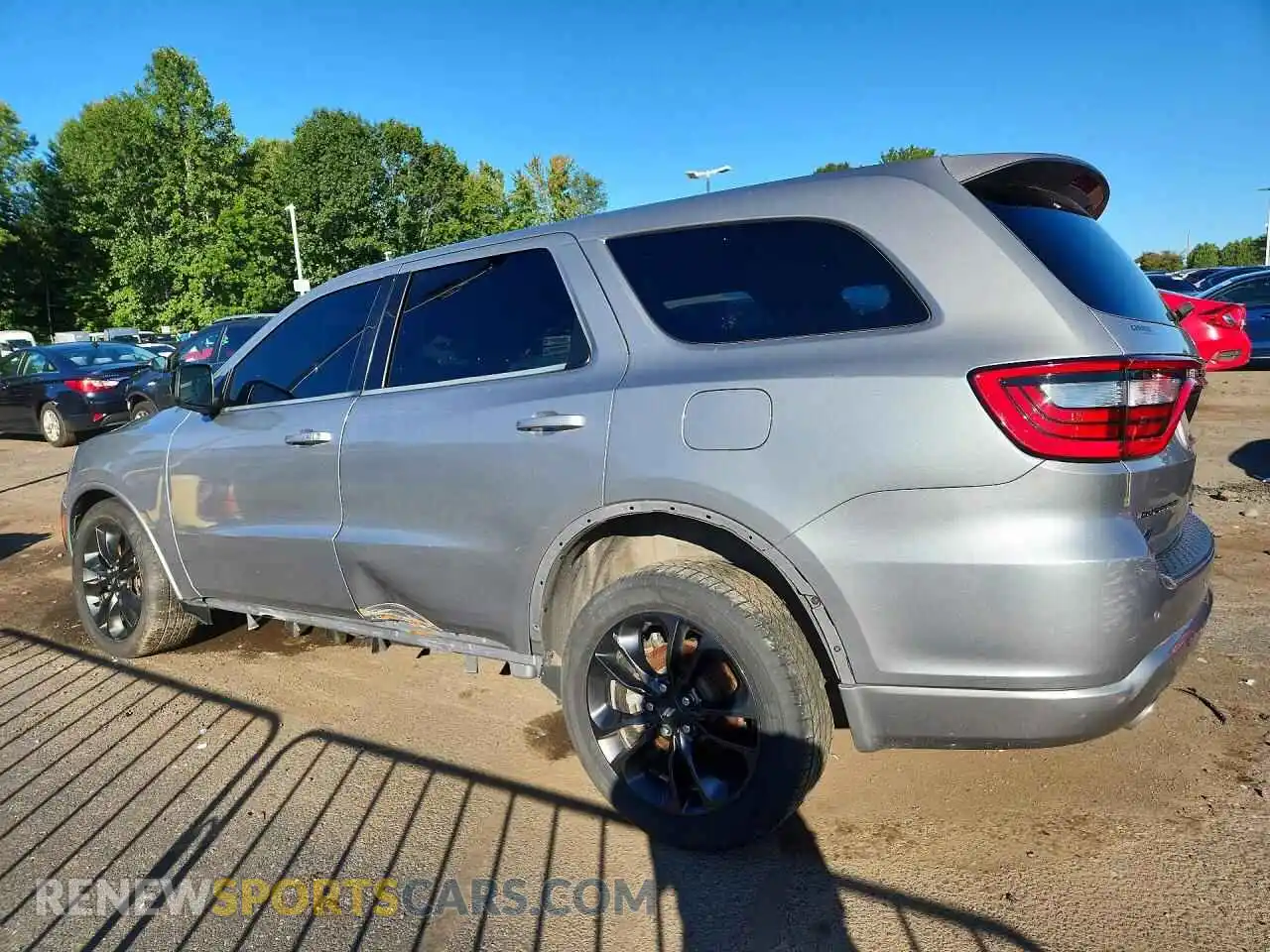 2 fotografías del automóvil dañado 1C4RDJAG6MC523864 DODGE DURANGO 2021