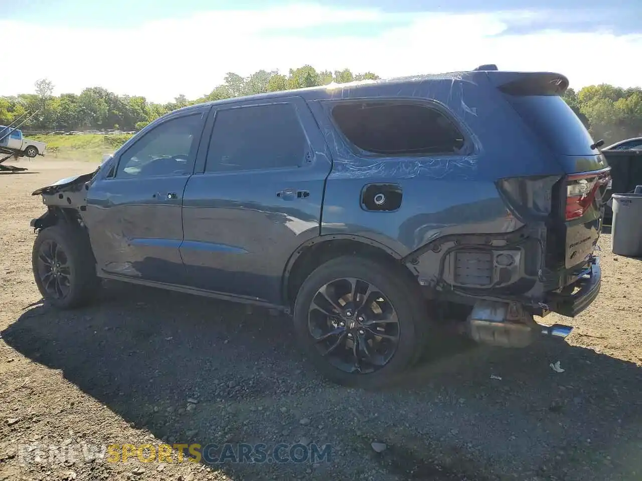 2 fotografías del automóvil dañado 1C4RDJAG6MC764856 DODGE DURANGO 2021