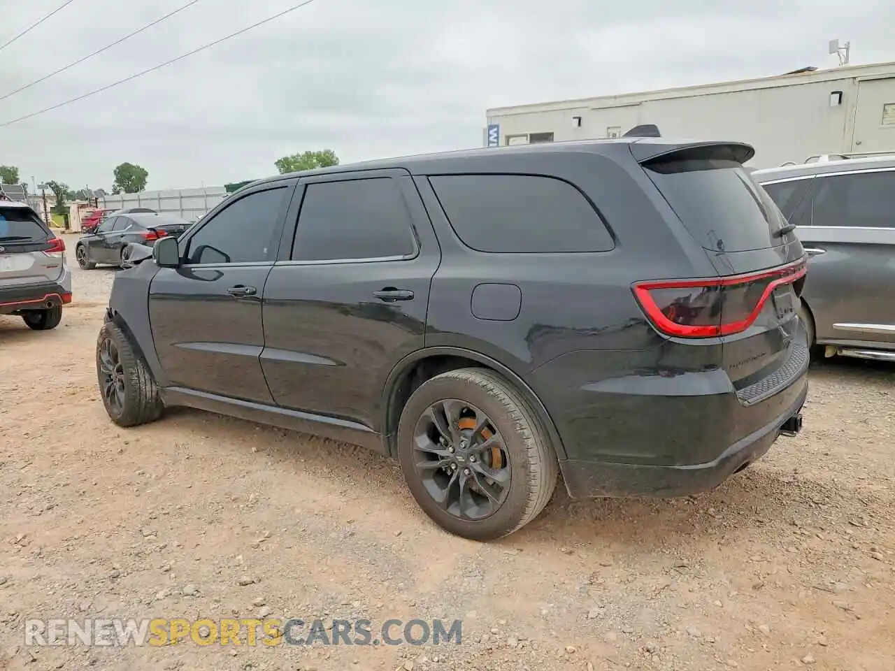 2 fotografías del automóvil dañado 1C4SDHCT1MC693859 DODGE DURANGO 2021