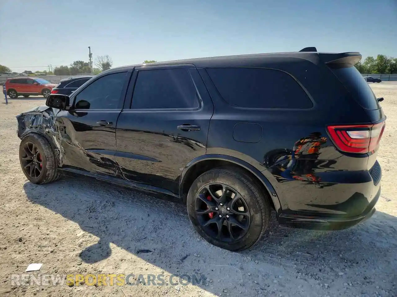 2 fotografías del automóvil dañado 1C4SDJH94MC757073 DODGE DURANGO 2021