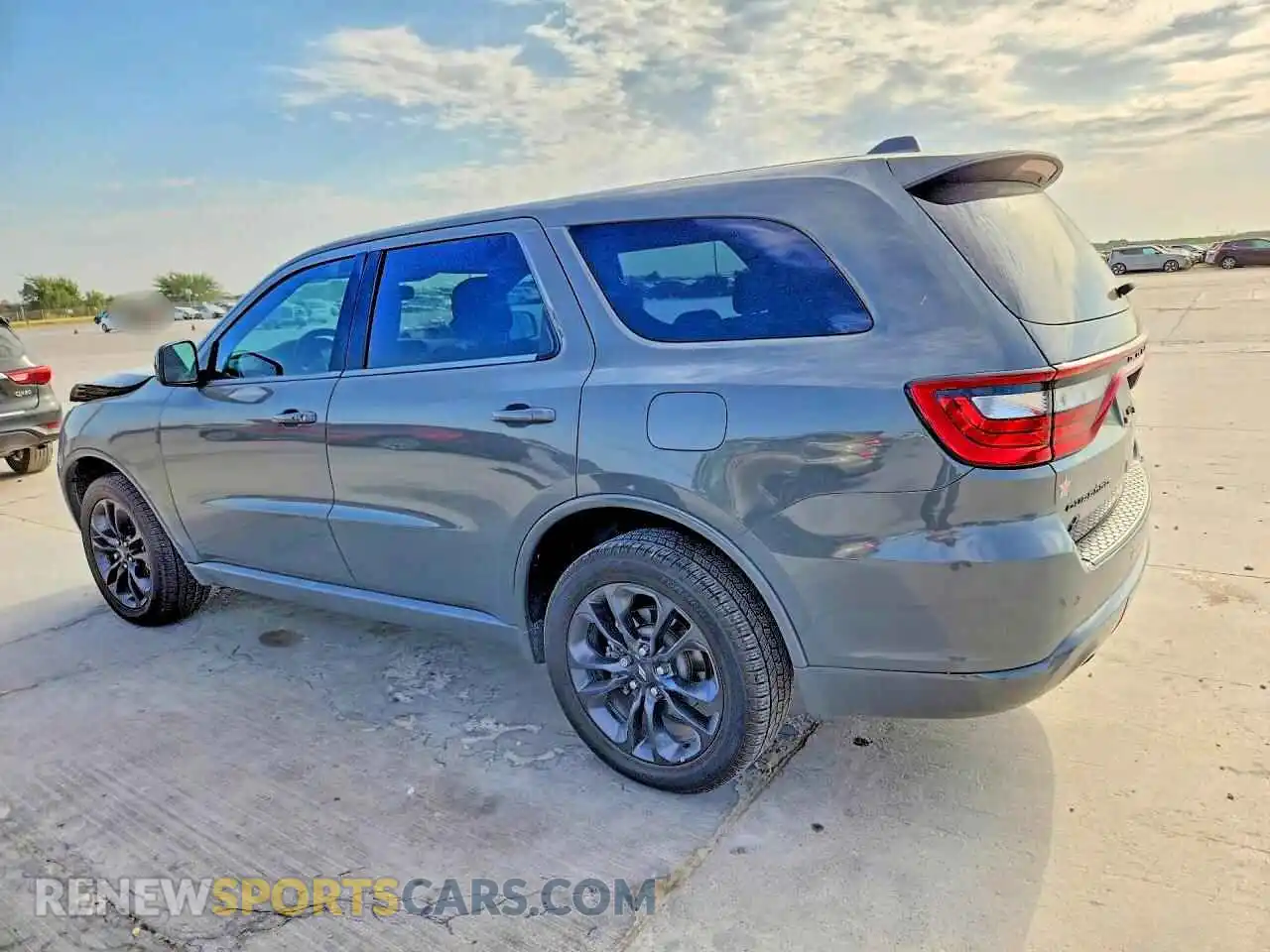 2 fotografías del automóvil dañado 1C4RDJAG7NC173727 DODGE DURANGO 2022