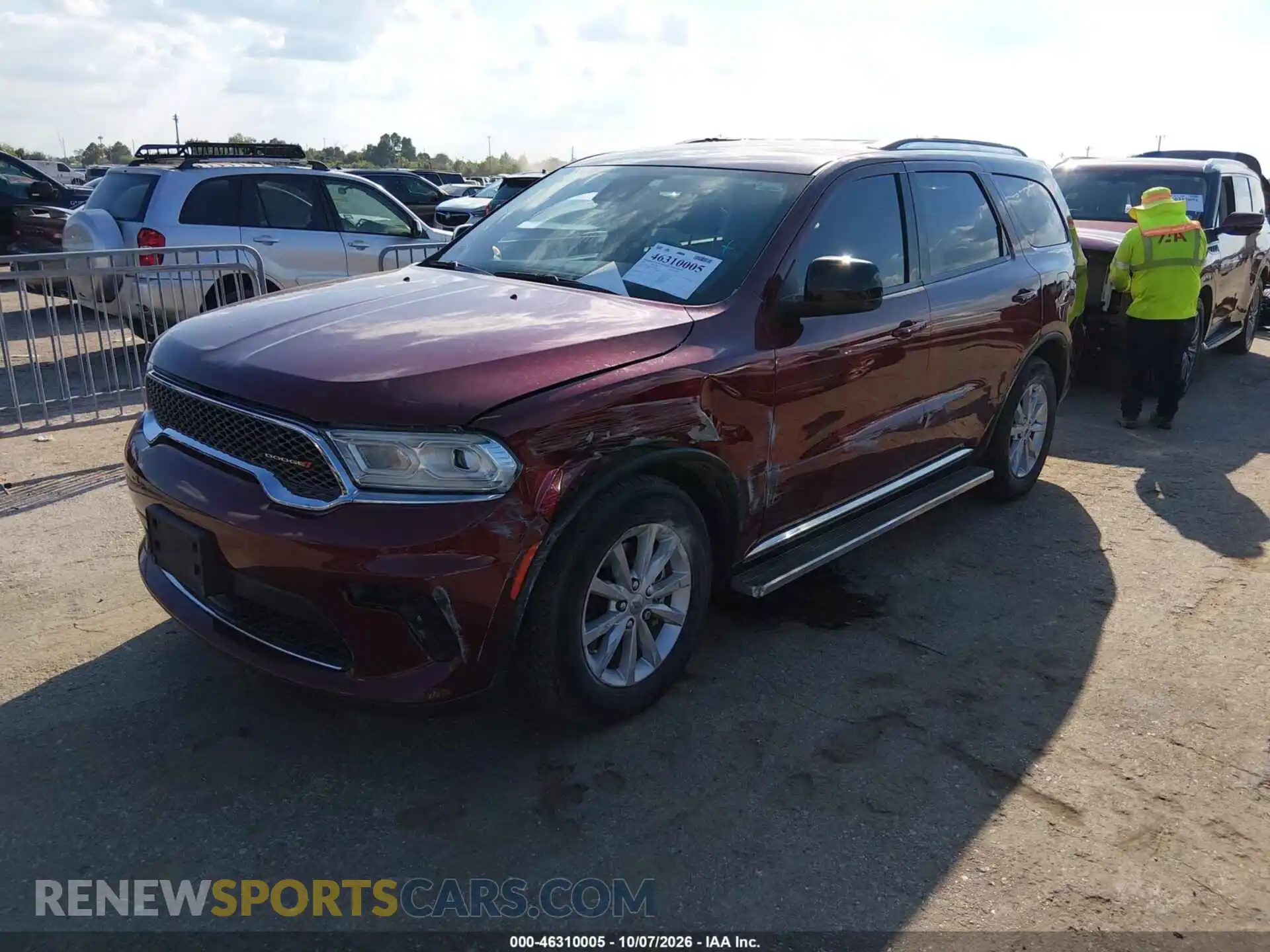2 fotografías del automóvil dañado 1C4RDHAG5PC587763 DODGE DURANGO 2023