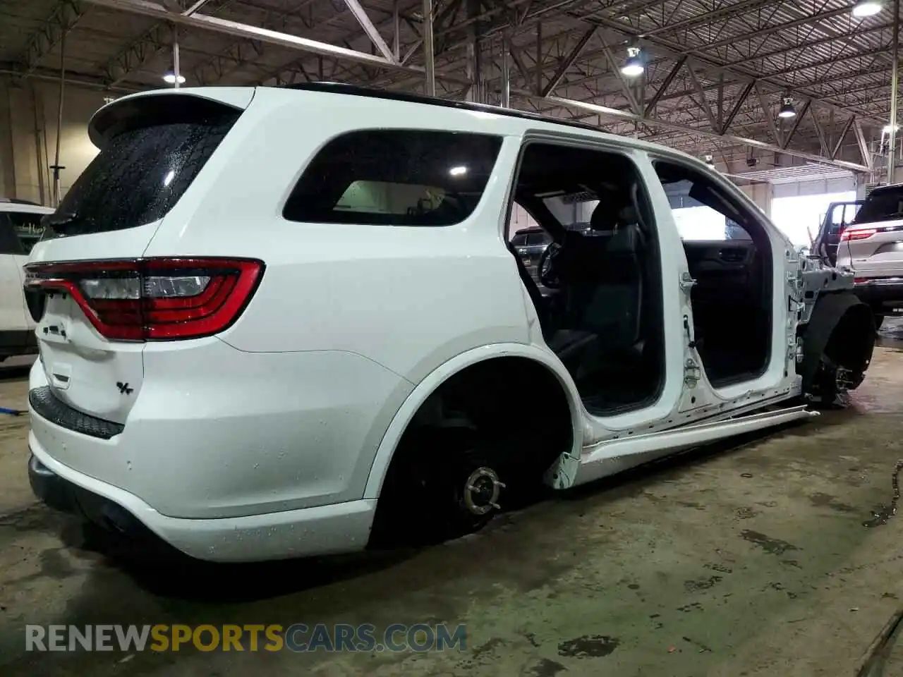 3 Photograph of a damaged car 1C4SDJCT0PC556455 DODGE DURANGO 2023