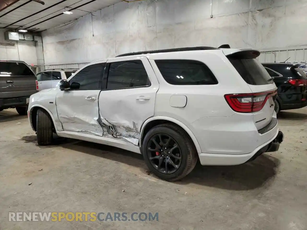 2 Photograph of a damaged car 1C4SDJGJ9PC627774 DODGE DURANGO 2023