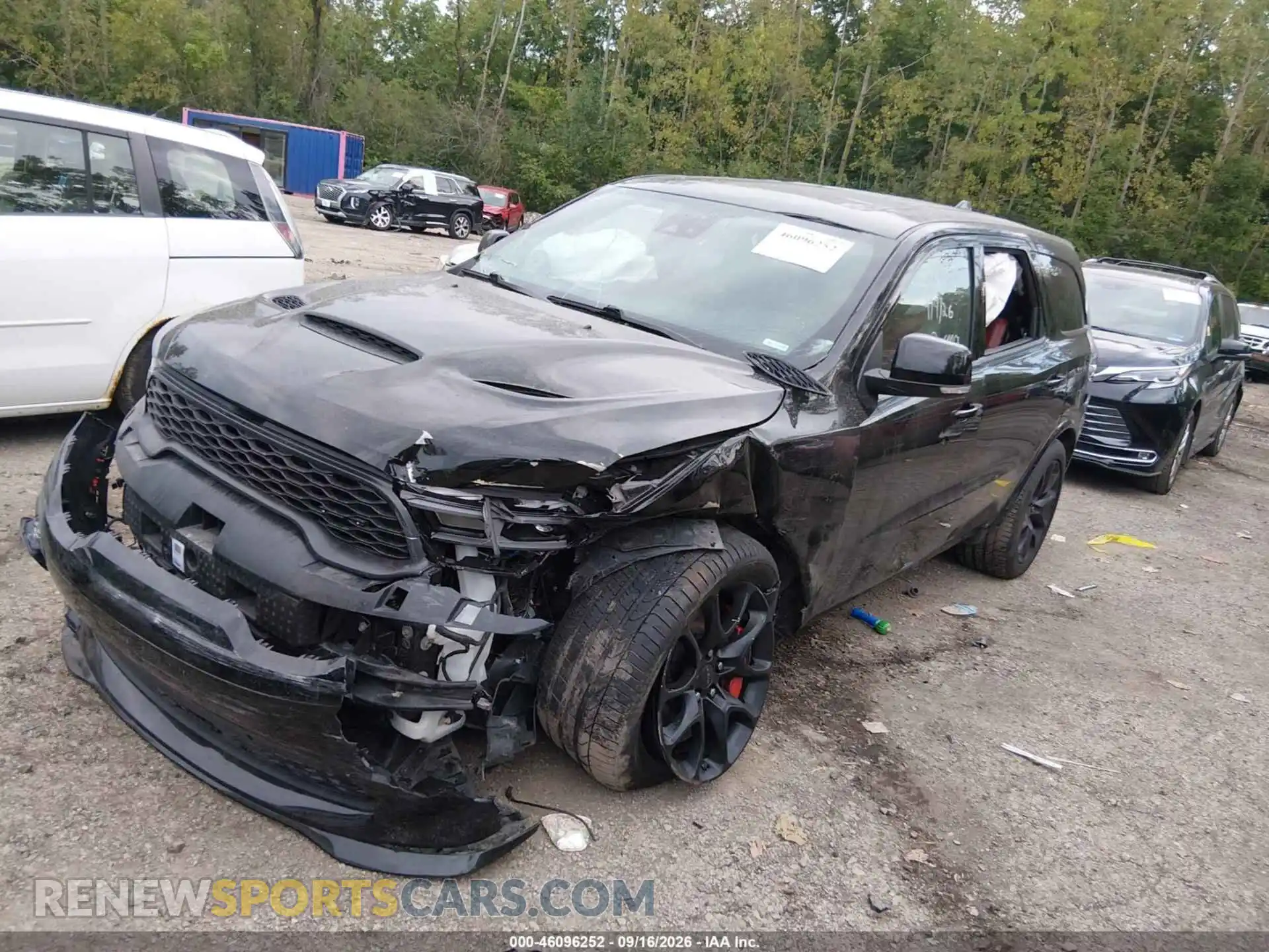 2 fotografías del automóvil dañado 1C4SDJH90PC584866 DODGE DURANGO 2023