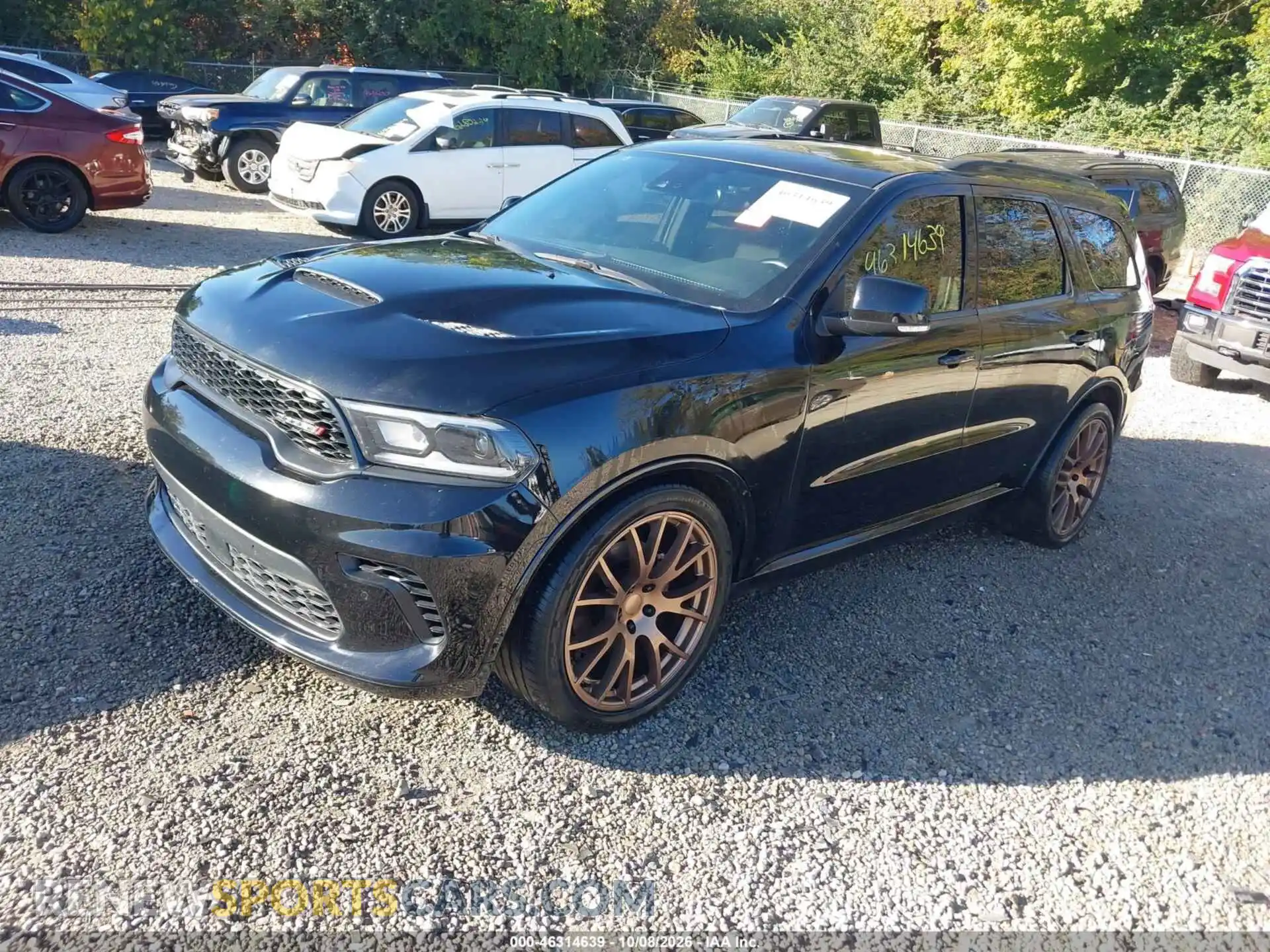 2 fotografías del automóvil dañado 1C4SDJCT4RC150049 DODGE DURANGO 2024
