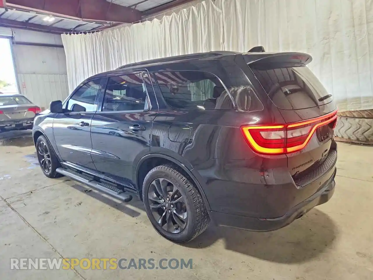 2 fotografías del automóvil dañado 1C4SDJCT6RC161554 DODGE DURANGO 2024