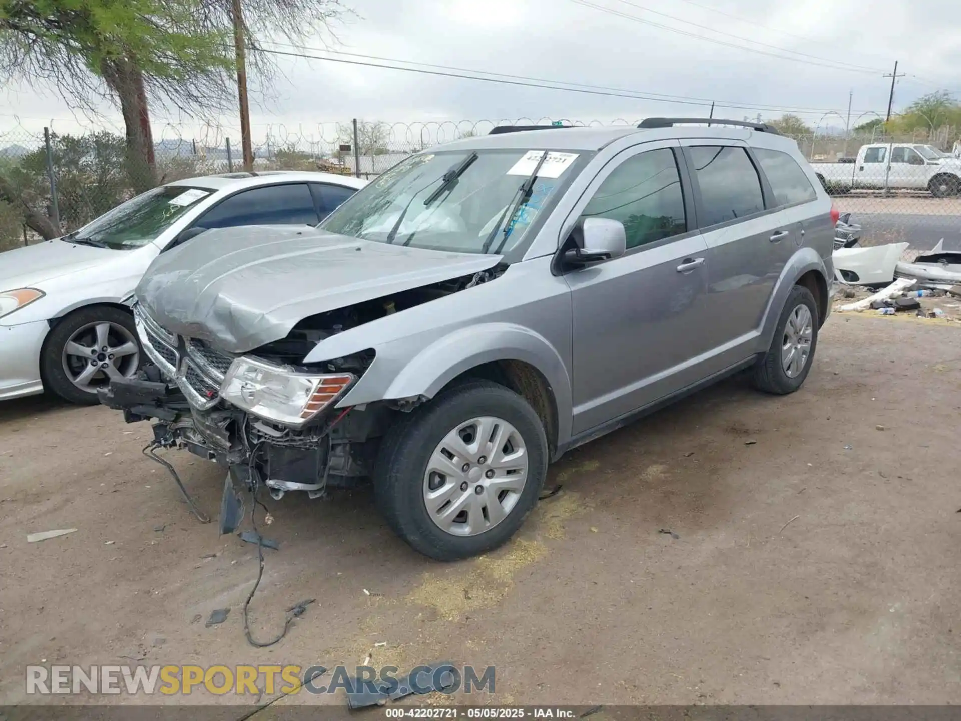 2 Photograph of a damaged car 3C4PDCBB0KT798928 DODGE JOURNEY 2019