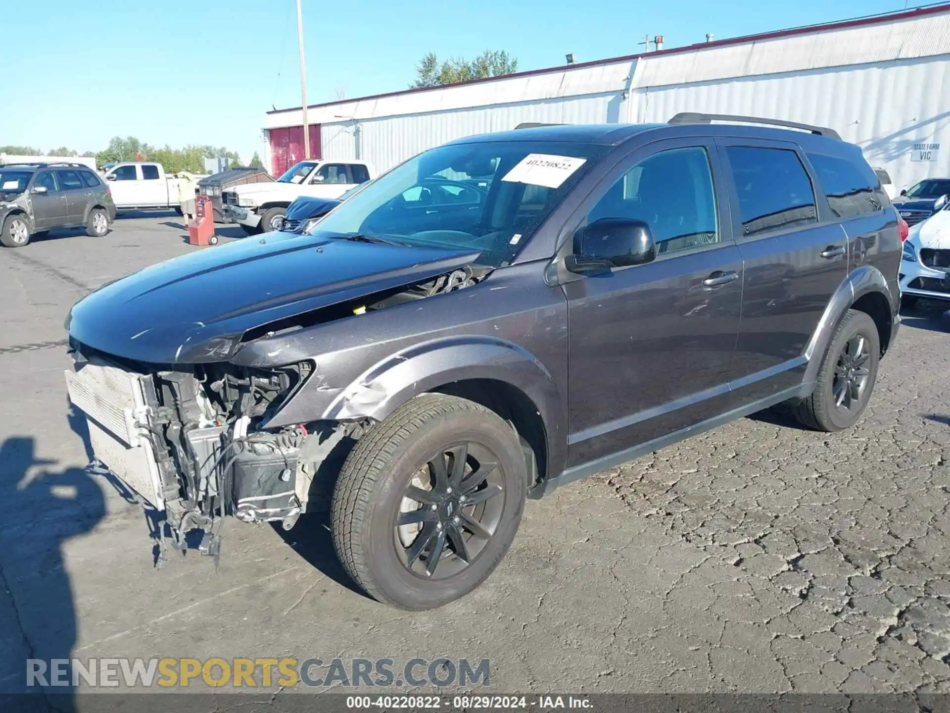 2 Photograph of a damaged car 3C4PDCBB0KT874812 DODGE JOURNEY 2019