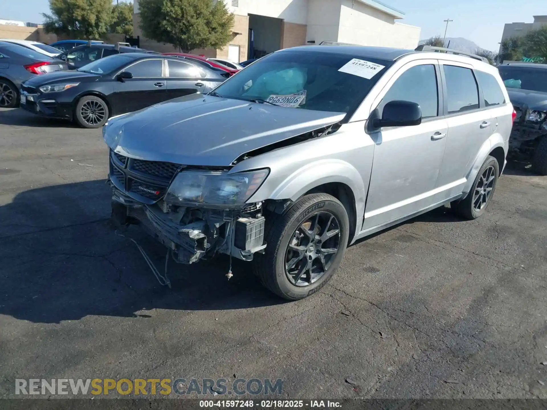 2 Photograph of a damaged car 3C4PDCBB5KT687131 DODGE JOURNEY 2019