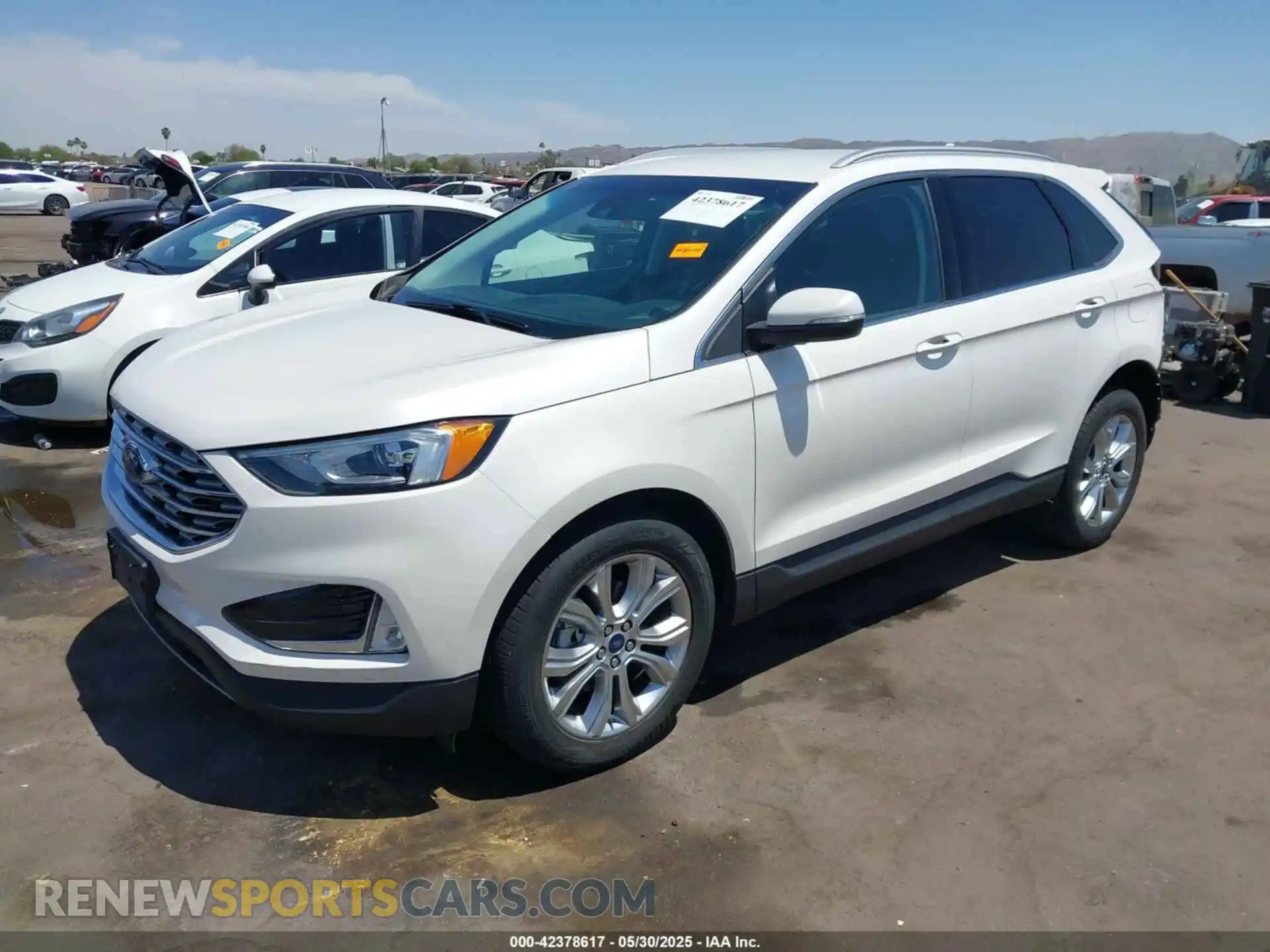 2 fotografías del automóvil dañado 2FMPK3K9XKBB38860 FORD EDGE 2019