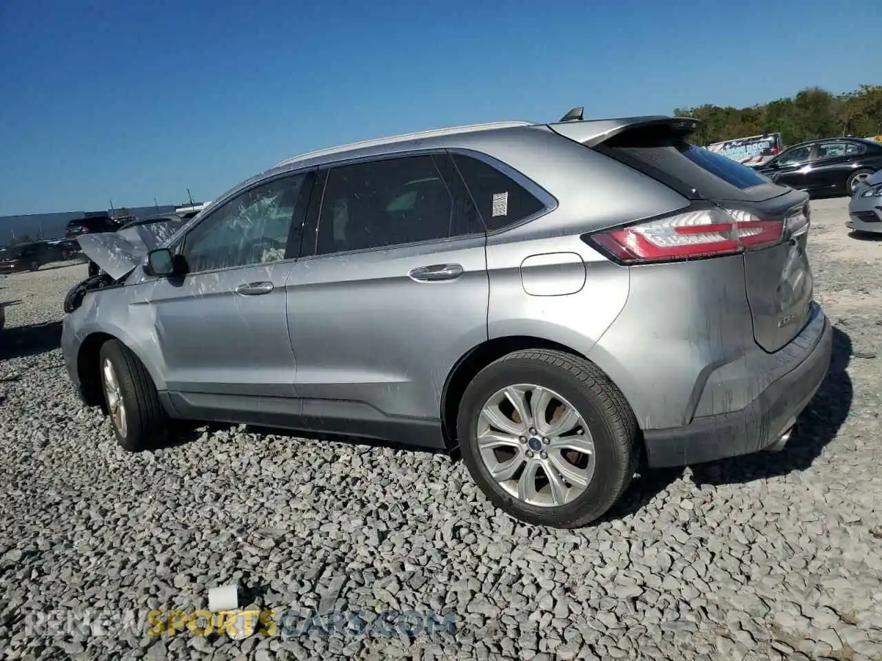 2 fotografías del automóvil dañado 2FMPK3K9XLBB35894 FORD EDGE 2020