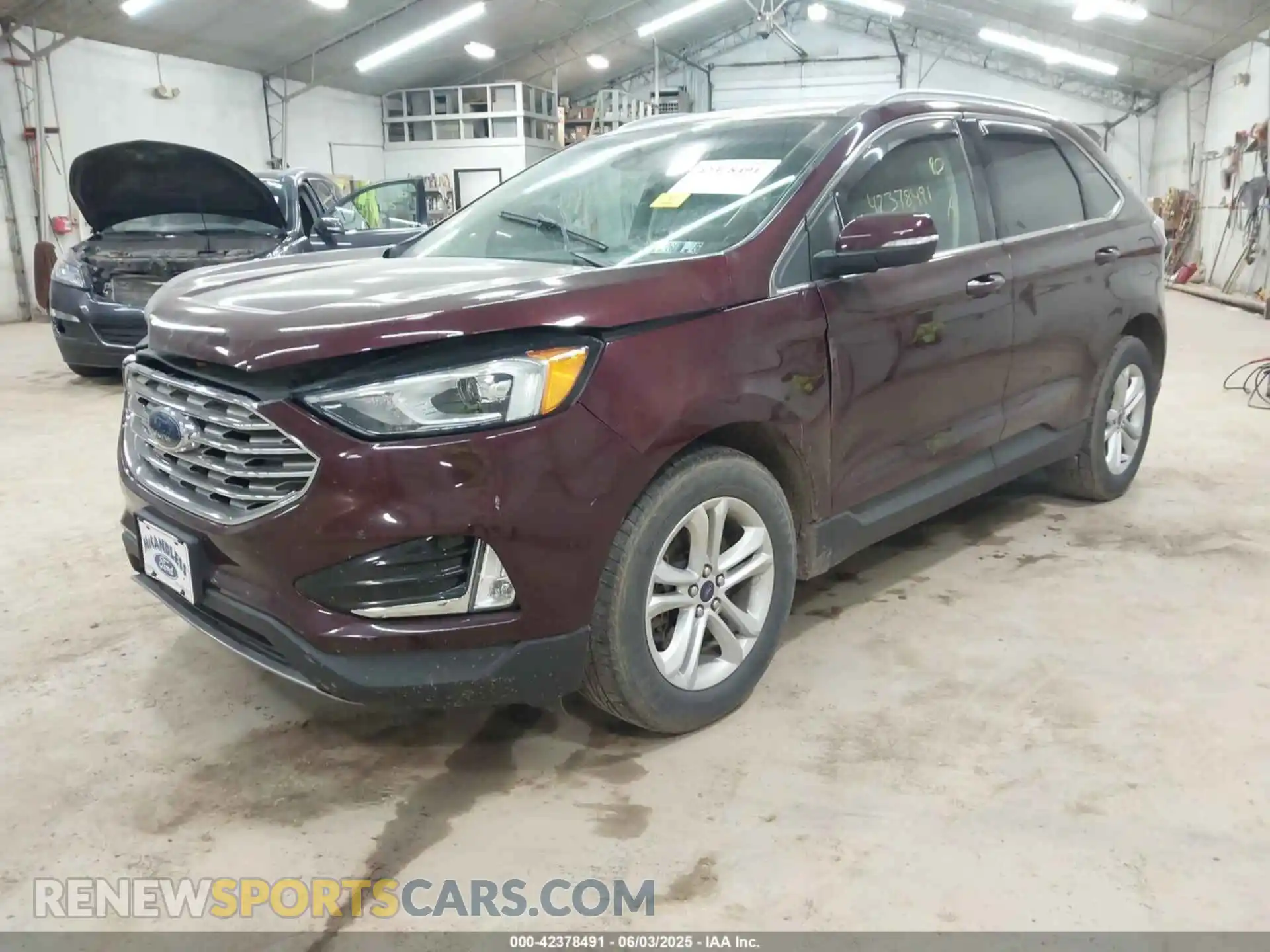 2 fotografías del automóvil dañado 2FMPK4J98LBB03257 FORD EDGE 2020