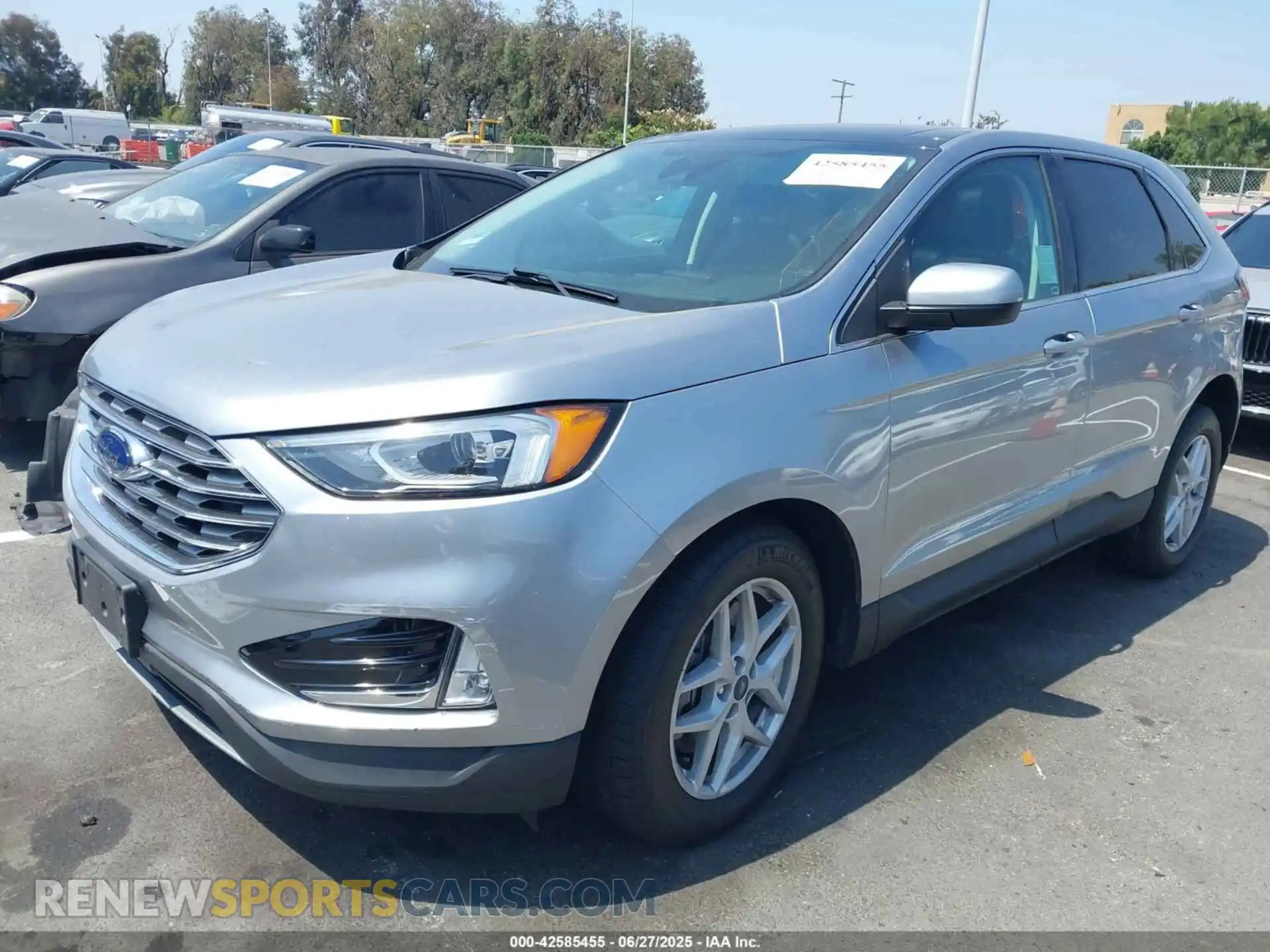 2 fotografías del automóvil dañado 2FMPK4J90MBA40348 FORD EDGE 2021
