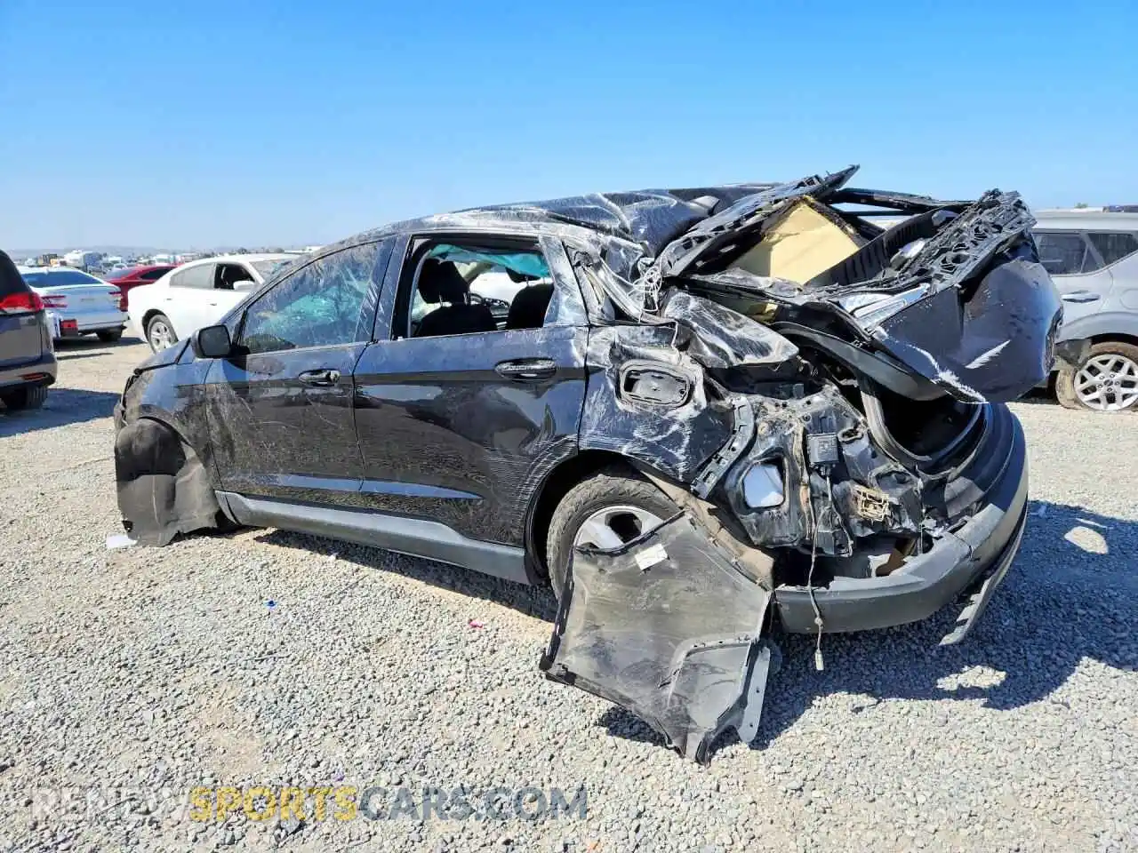 2 fotografías del automóvil dañado 2FMPK4G96NBA47345 FORD EDGE 2022