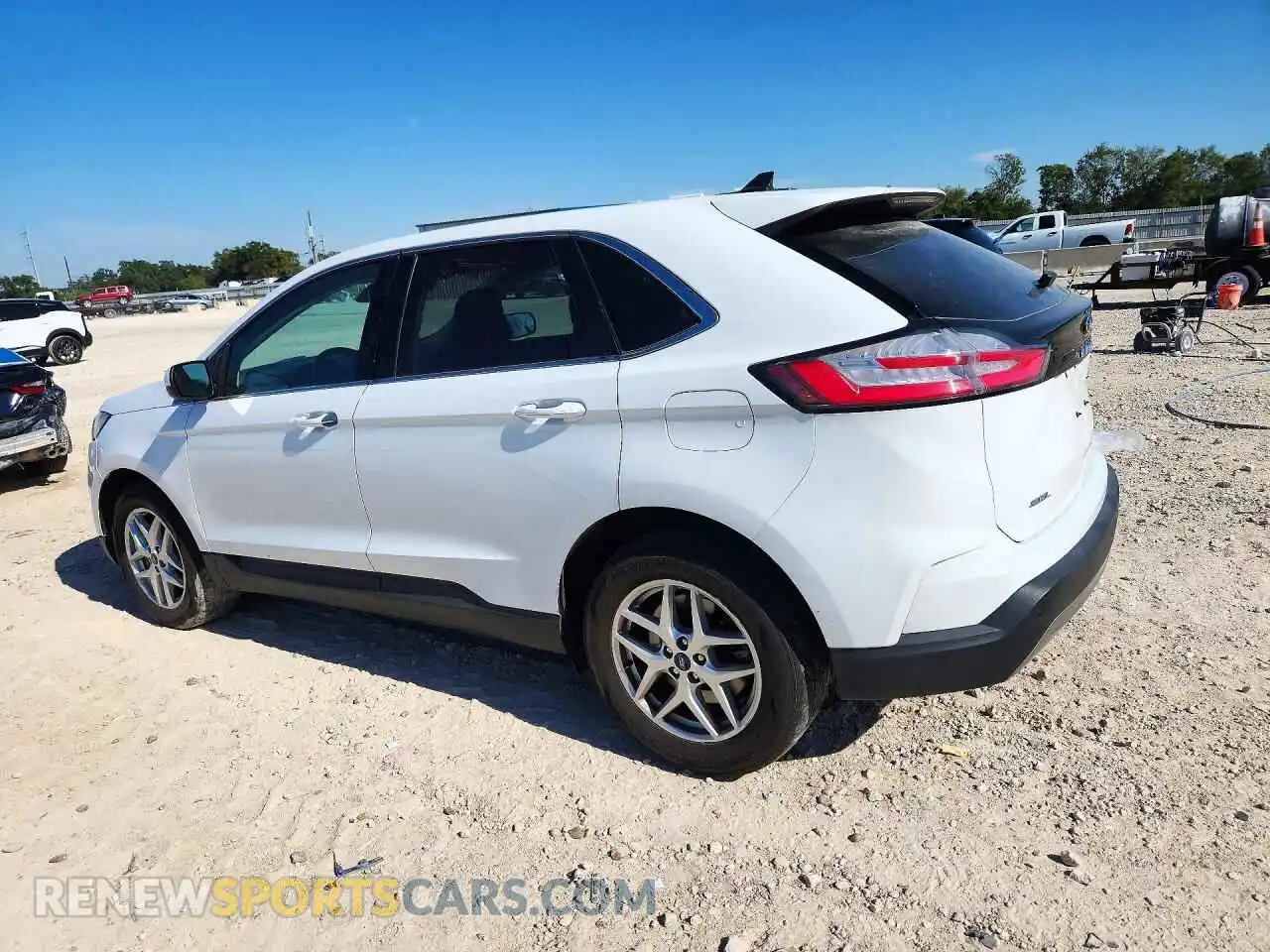 2 fotografías del automóvil dañado 2FMPK4J90NBA54493 FORD EDGE 2022