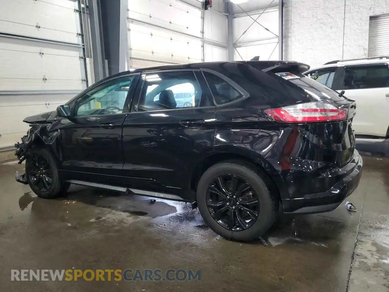 2 fotografías del automóvil dañado 2FMPK4G96PBA04191 FORD EDGE 2023