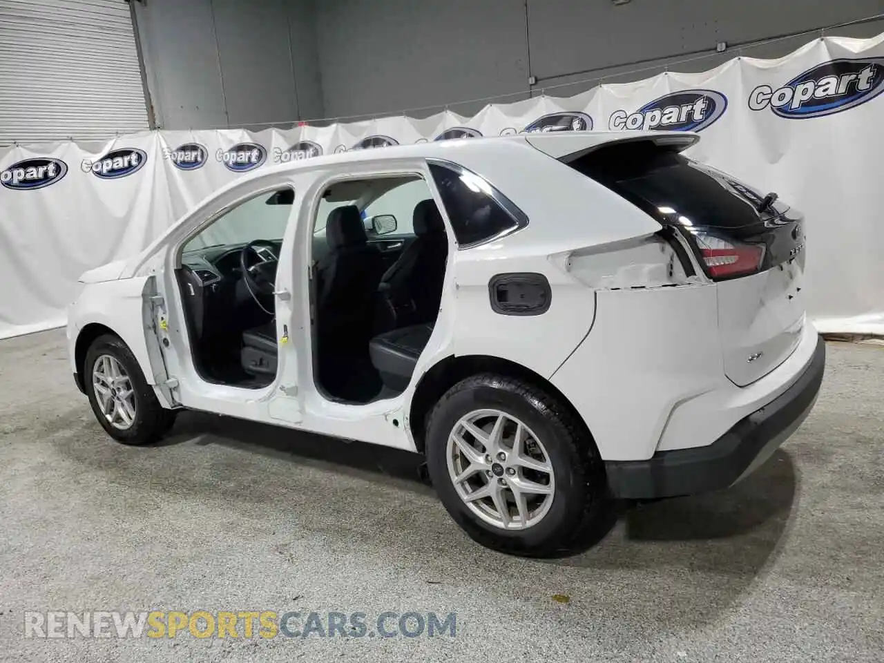 2 fotografías del automóvil dañado 2FMPK4J92PBA59147 FORD EDGE 2023