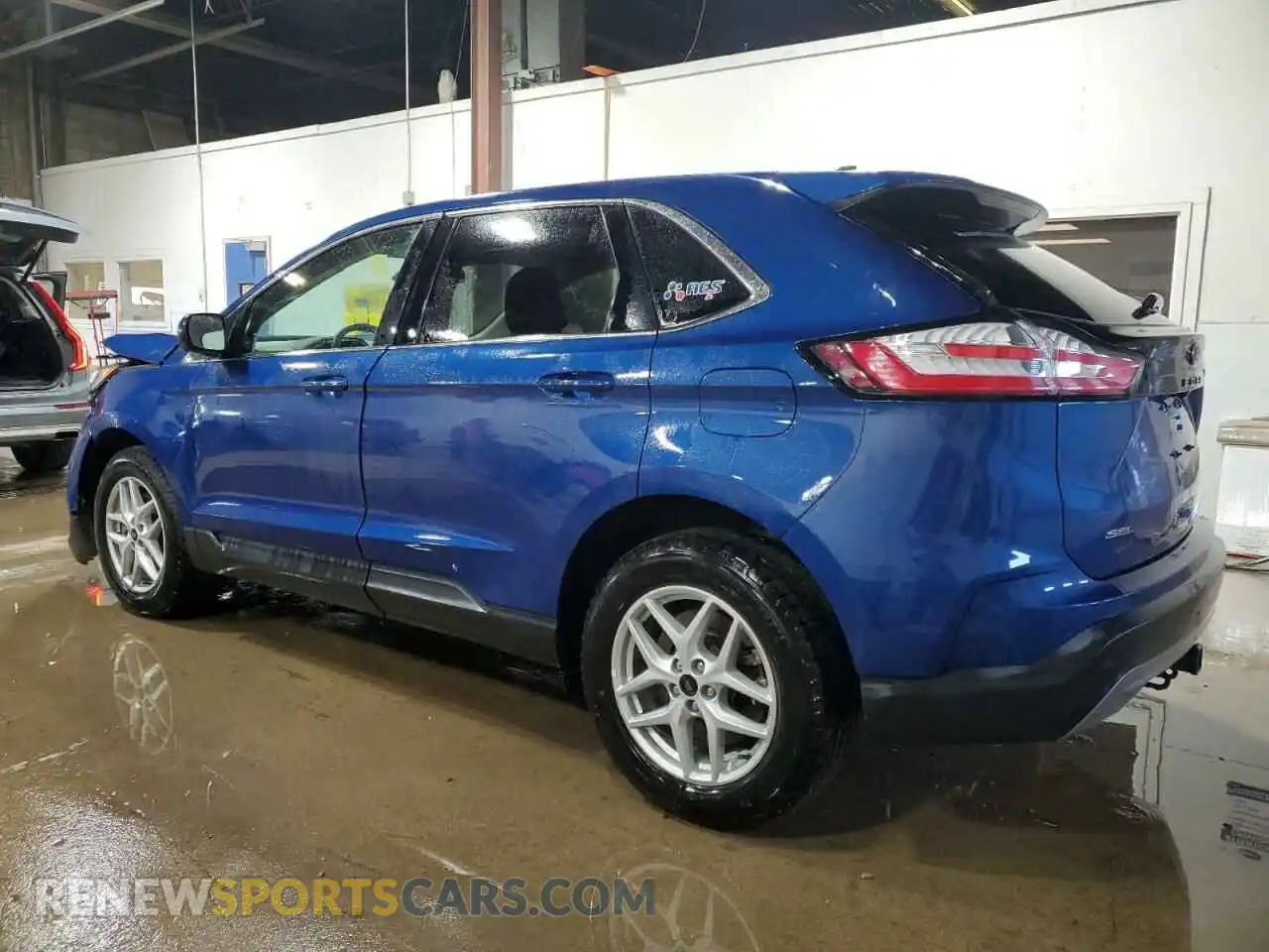 2 fotografías del automóvil dañado 2FMPK4J97PBA13569 FORD EDGE 2023