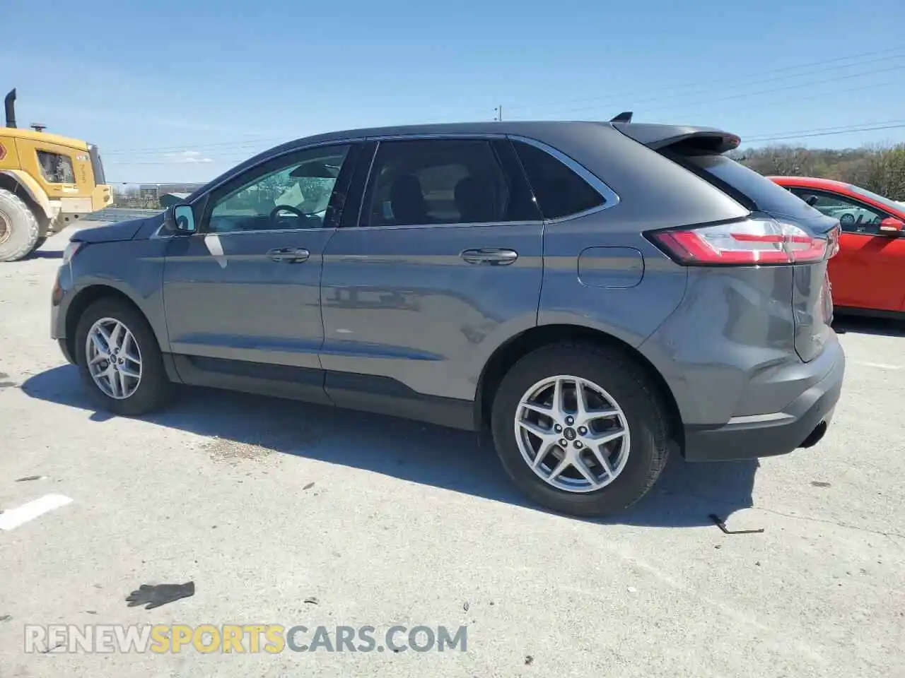 2 fotografías del automóvil dañado 2FMPK4J97PBA39606 FORD EDGE 2023