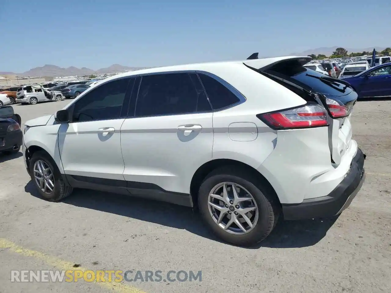 2 fotografías del automóvil dañado 2FMPK4J95RBA30244 FORD EDGE 2024