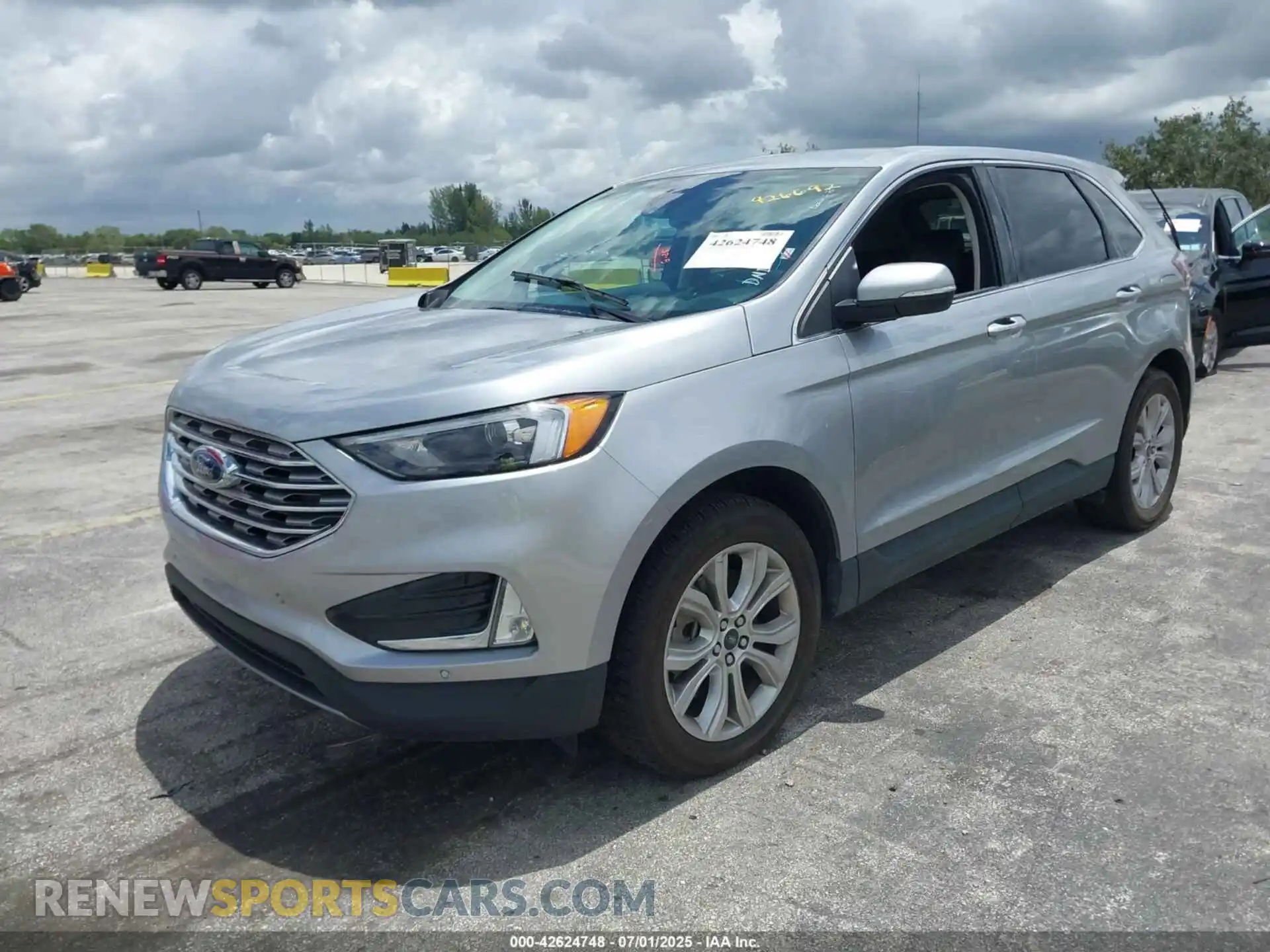 2 fotografías del automóvil dañado 2FMPK4K9XRBA47636 FORD EDGE 2024