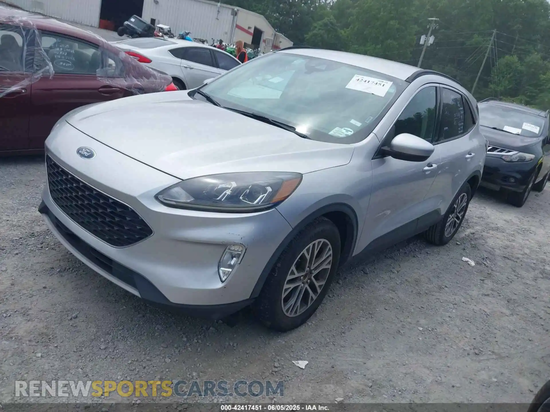 2 fotografías del automóvil dañado 1FMCU9H94LUA29583 FORD ESCAPE 2020