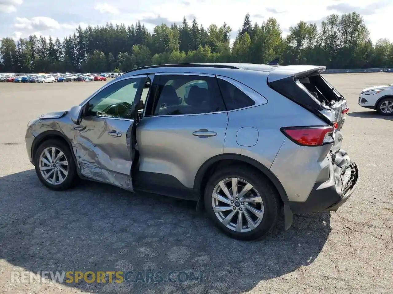 2 fotografías del automóvil dañado 1FMCU9DZ8MUA91656 FORD ESCAPE 2021