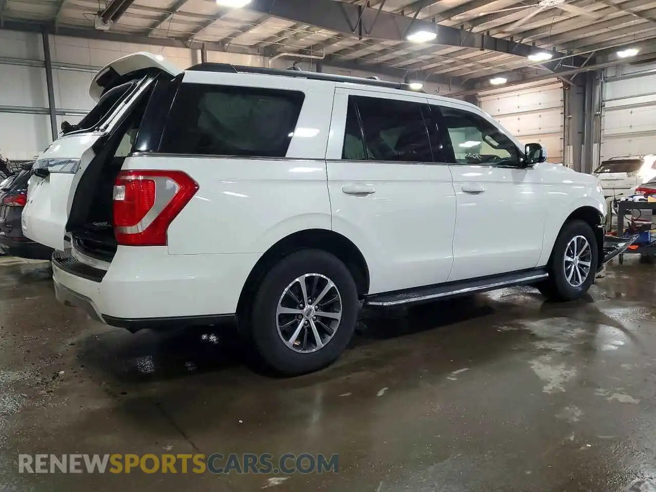 3 Photograph of a damaged car 1FMJU1JT5MEA23205 FORD EXPEDITION 2021