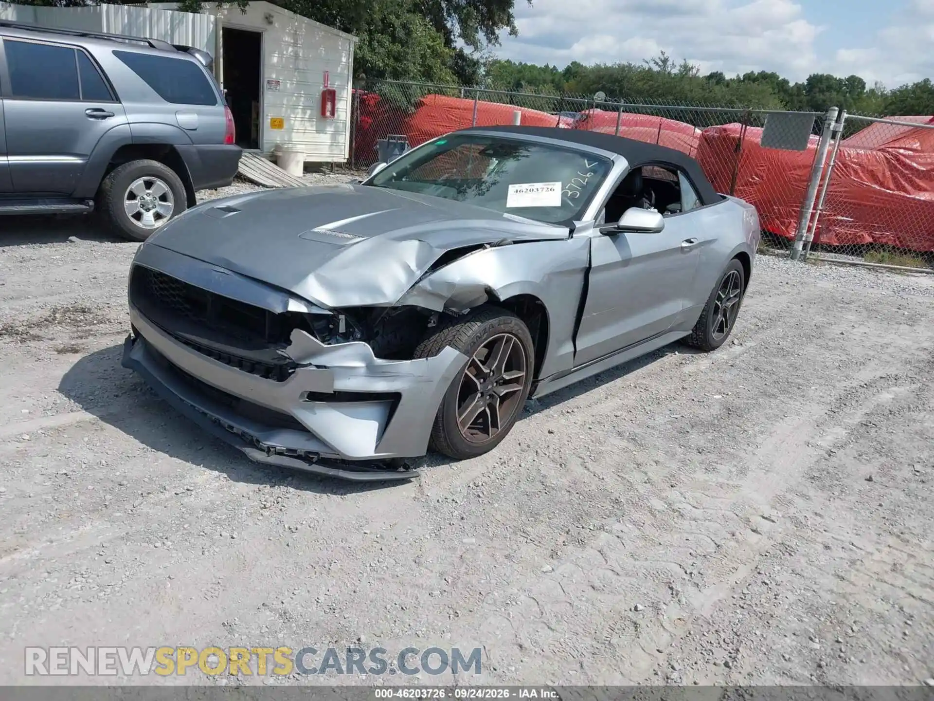 2 fotografías del automóvil dañado 1FATP8UH2M5106990 FORD MUSTANG 2021
