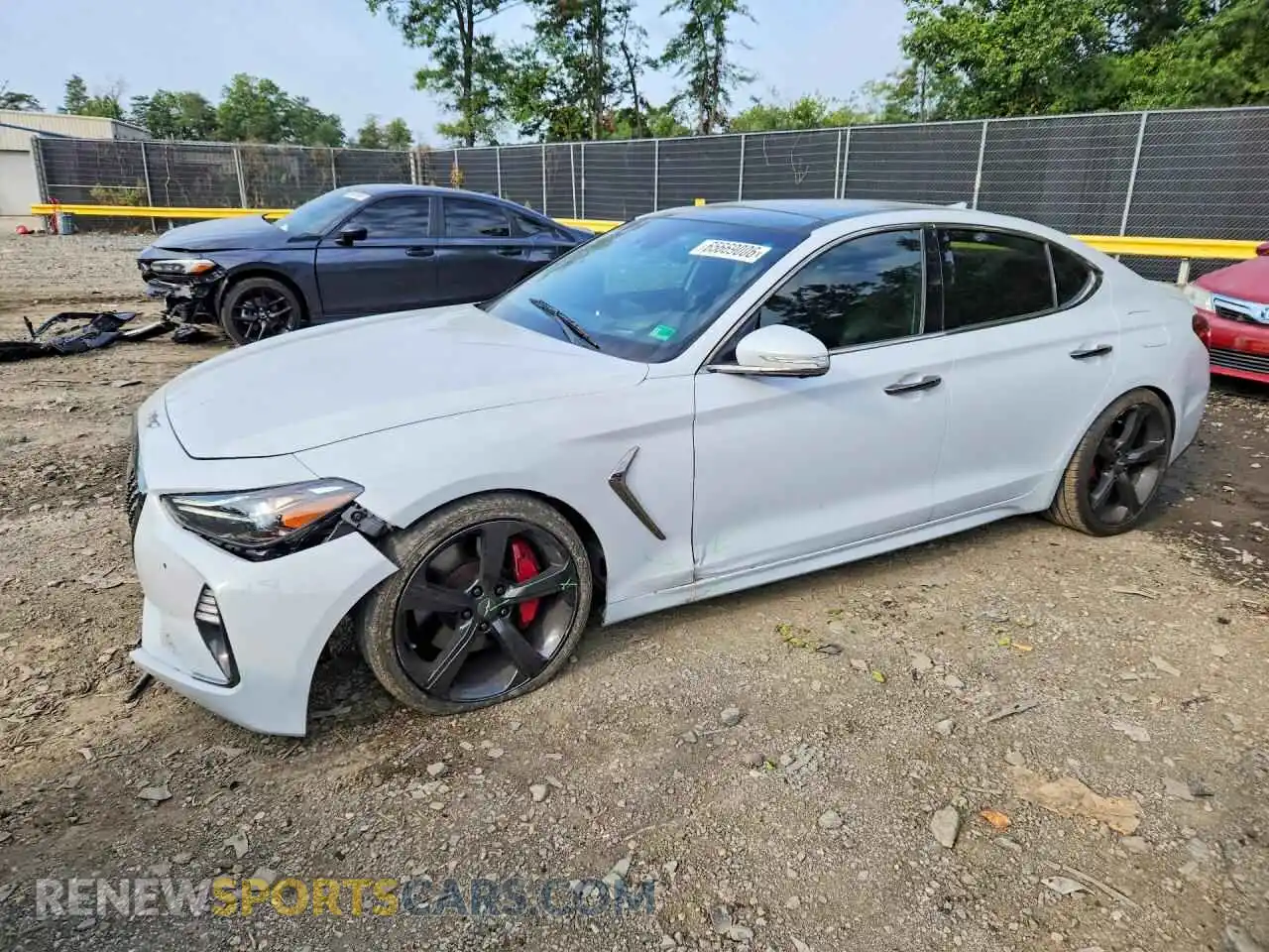 1 Photograph of a damaged car KMTG34LE7MU076674 GENESIS G70 2021