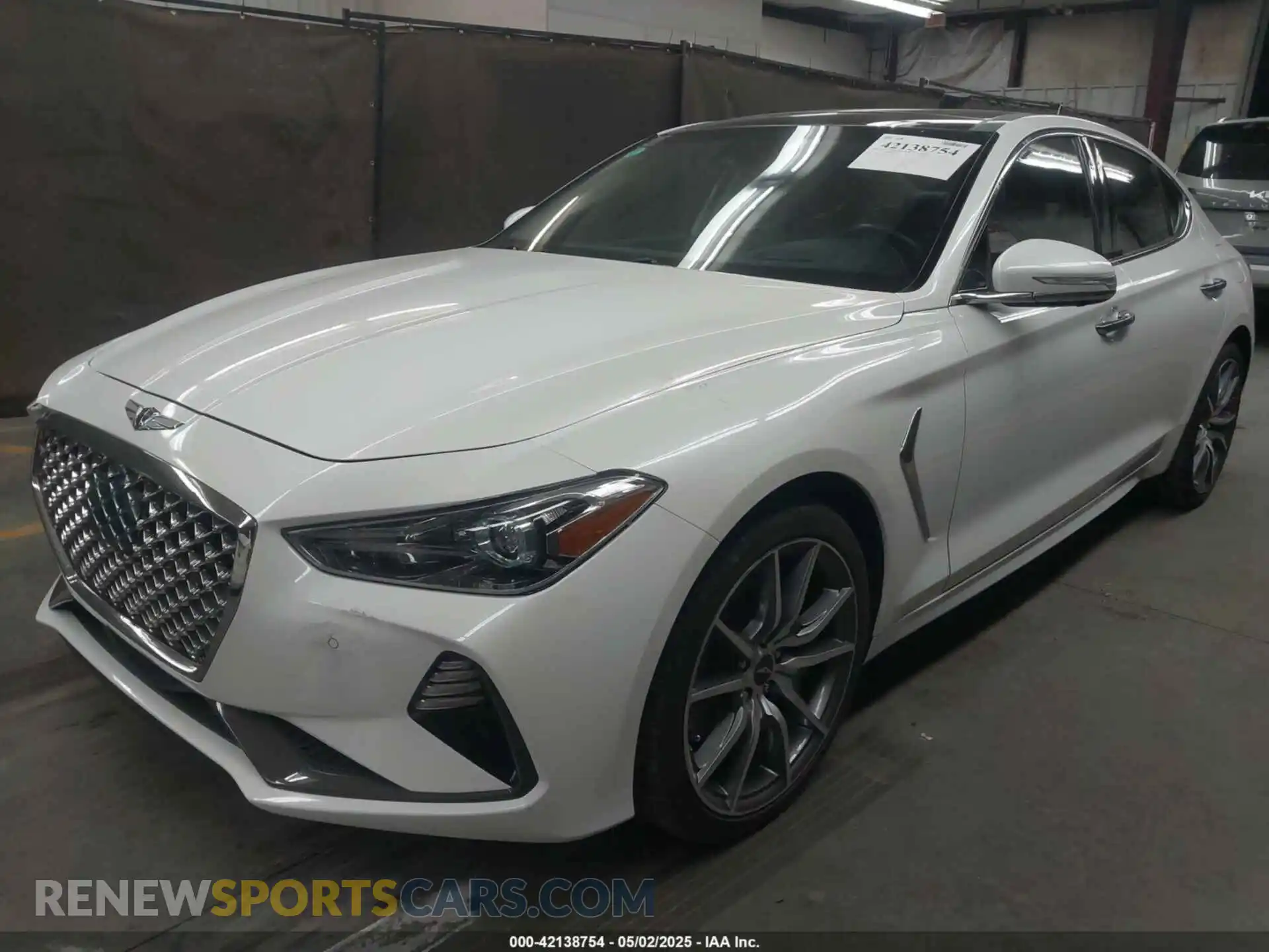 2 fotografías del automóvil dañado KMTG44LA2MU067102 GENESIS G70 2021