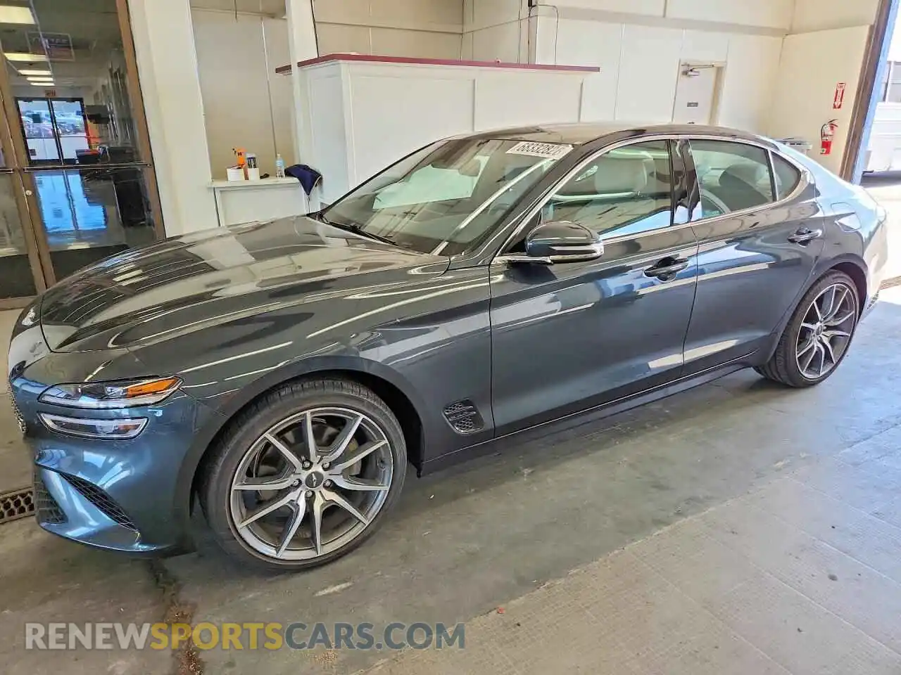 1 Photograph of a damaged car KMTG34TA1PU131069 GENESIS G70 2023