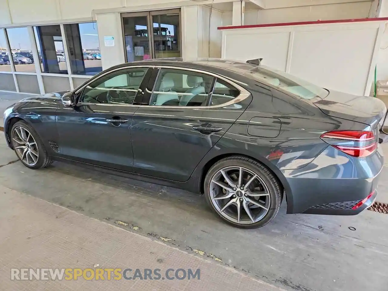 2 Photograph of a damaged car KMTG34TA1PU131069 GENESIS G70 2023