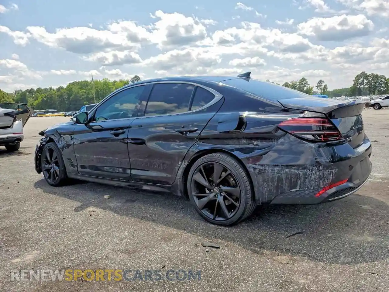 2 Photograph of a damaged car KMTG34TA6PU110167 GENESIS G70 2023