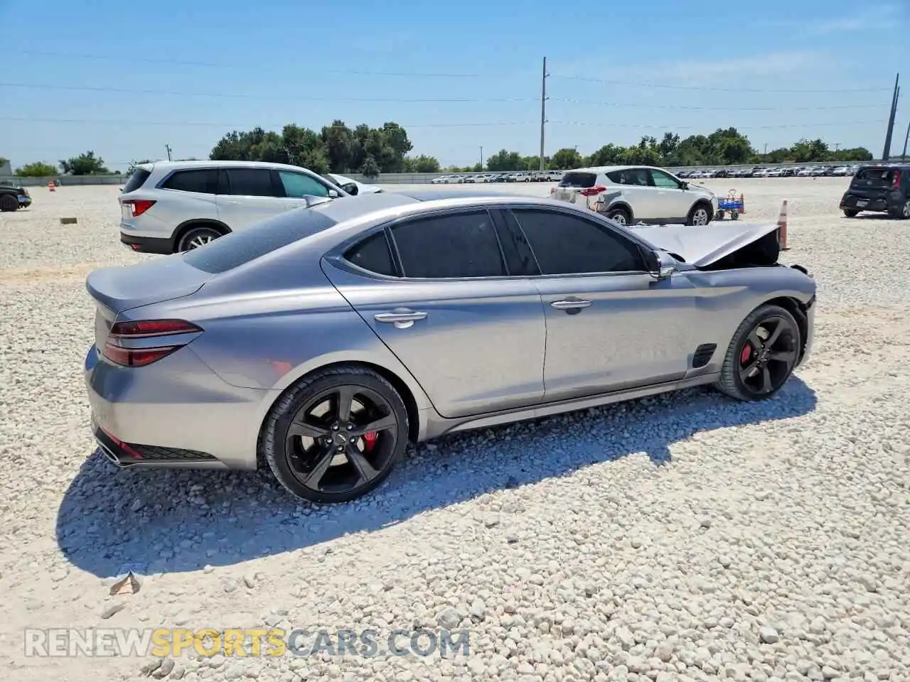 3 Photograph of a damaged car KMTG44SEXTU175244 GENESIS G70 2026