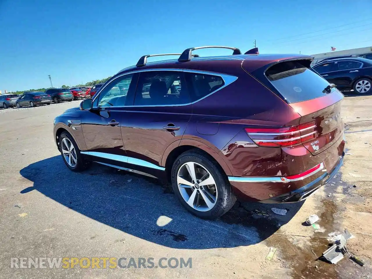 2 fotografías del automóvil dañado KMUHCESC6MU053568 GENESIS GV80 2021